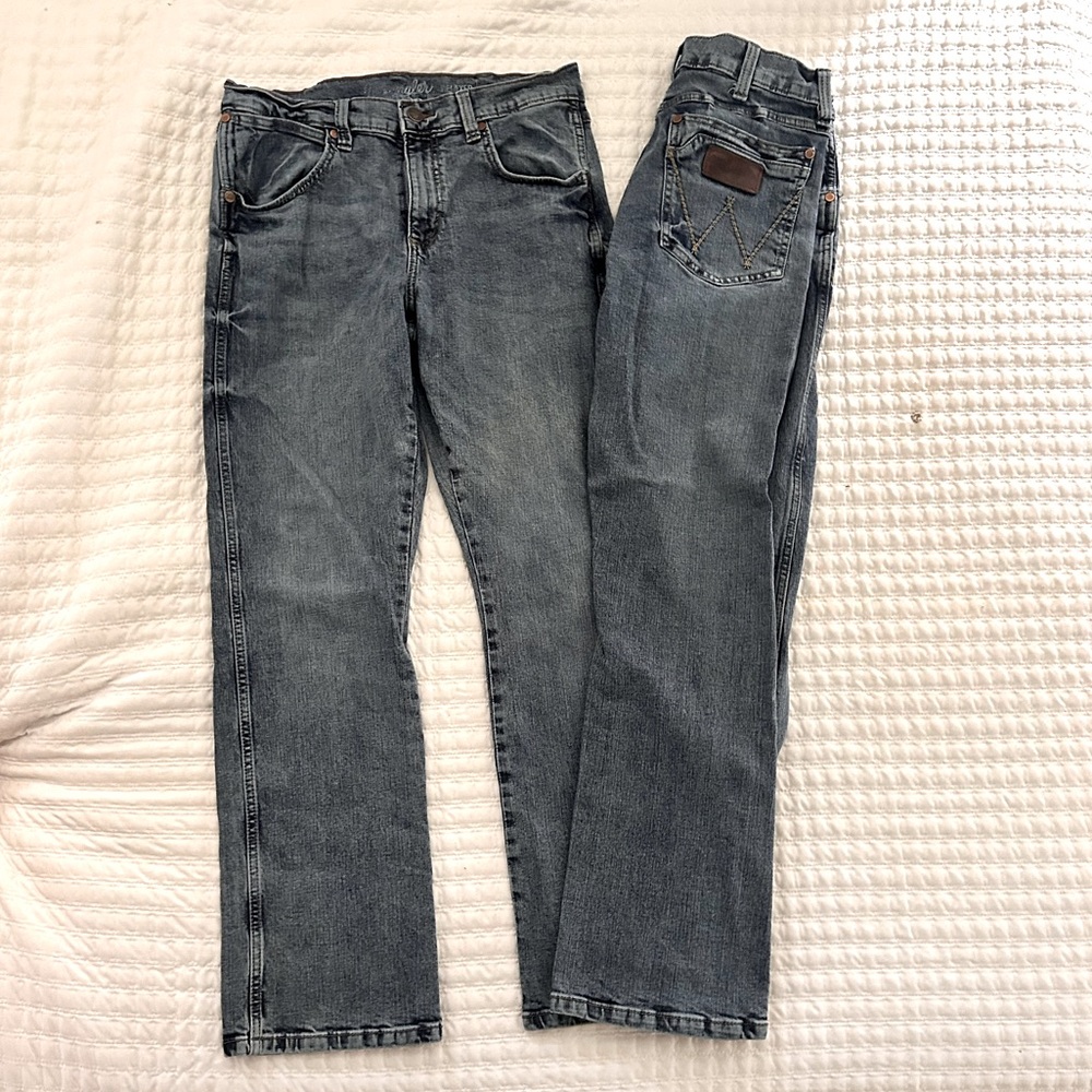 TWO pairs of Wrangler Relaxed Boootcut 31x32